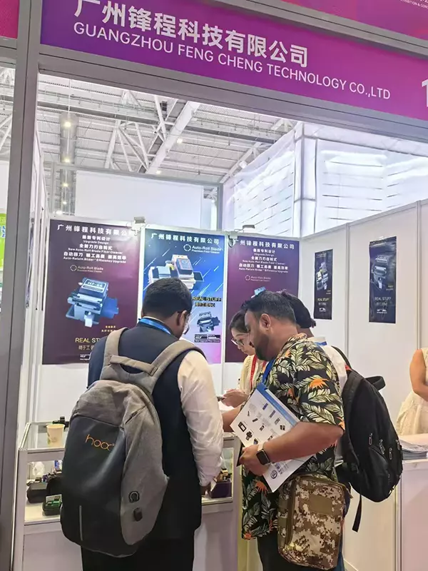 Interacting with and taking photos with clients at CIOE 2025