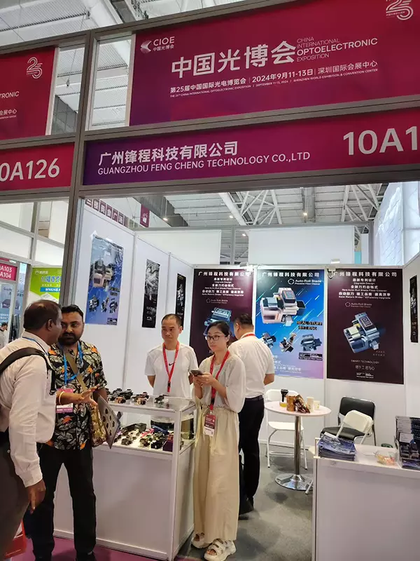 Interacting with and taking photos with clients at CIOE 2025